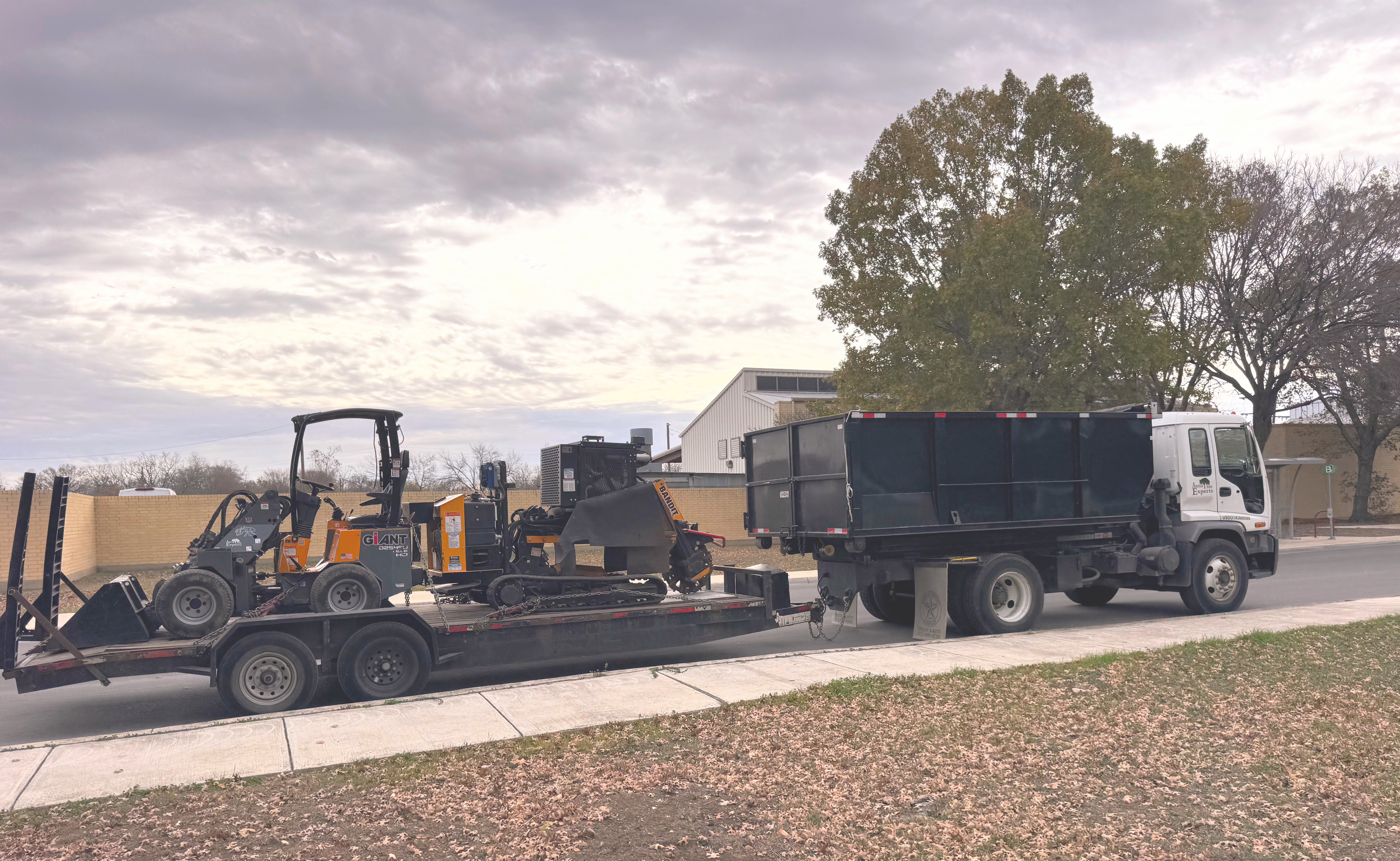 Austin Tree Experts stump grinding equipment on trailer ready for service